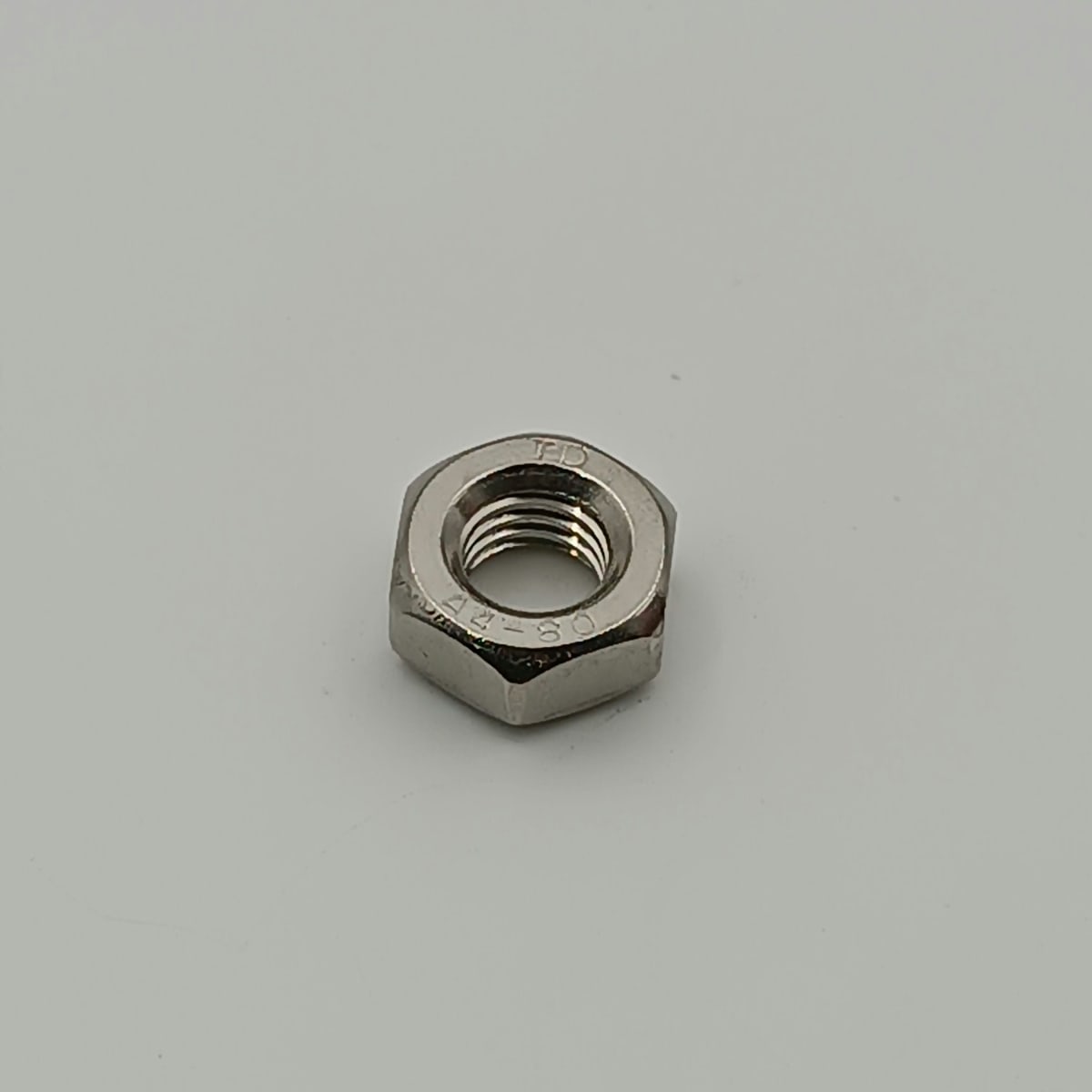 TUERCA DIN 985 A4 (316) SEGURO NYLON M4 - 0.703