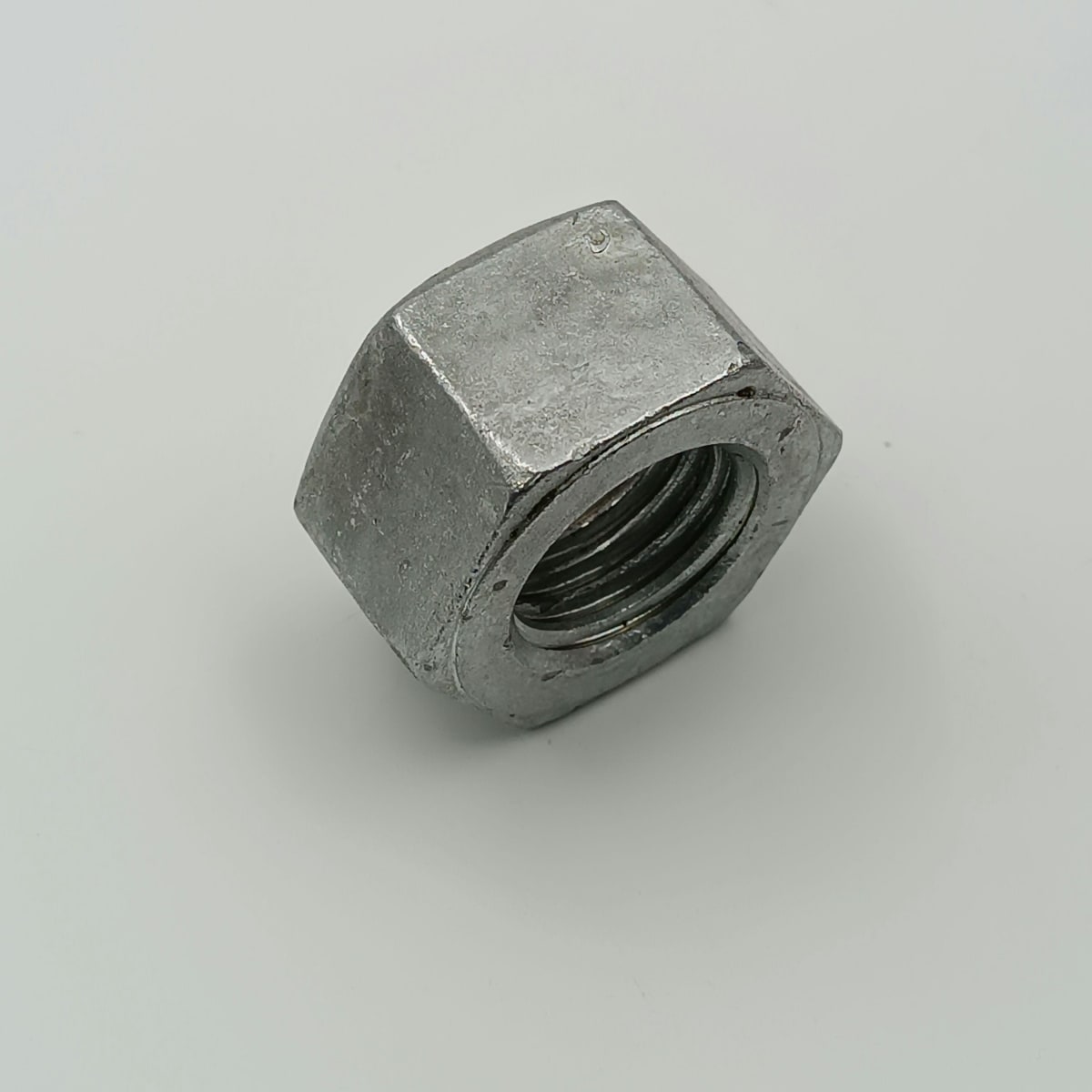 TUERCA HEXAGONAL REF. A-194 2H GALVANIZADA (HDG) 1 3/4 - 52