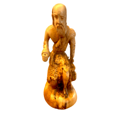 Figura de madera de rodillas