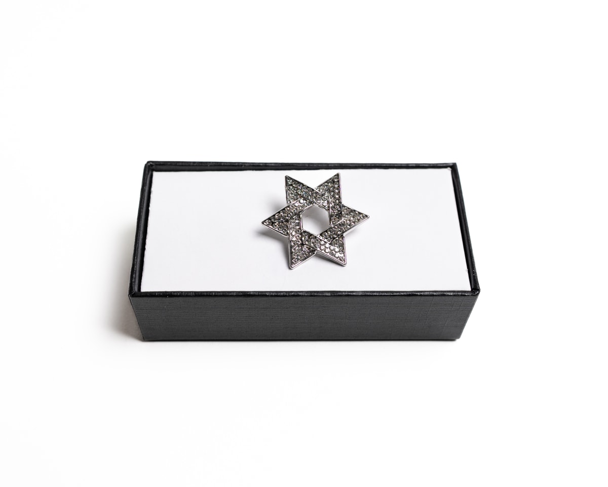 PIN SOLAPA ABR26 ESTRELLA