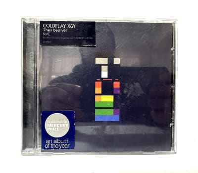 Coldplay - X&Y - CD Escuchado1