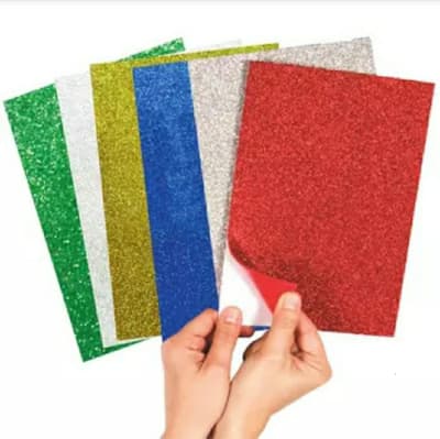 GOMA EVA GLITTER ADHESIVA 20X30 10uni1