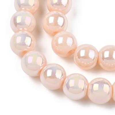CRISTAL AUSTRIACO LISO COLOR AB PLATEADO MELOCOTON 6X6.5MM APROX. 67PCS