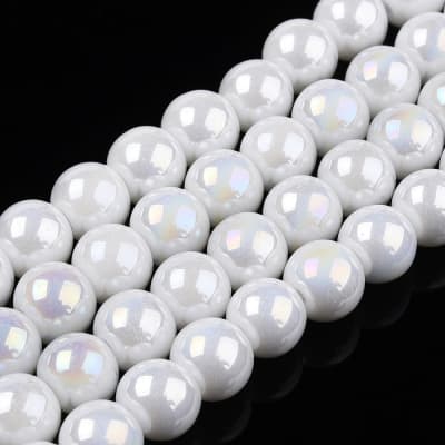 CRISTAL AUSTRIACO LISO COLOR AB PLATEADO BLANCO 6X6.5MM APROX. 67PCS1