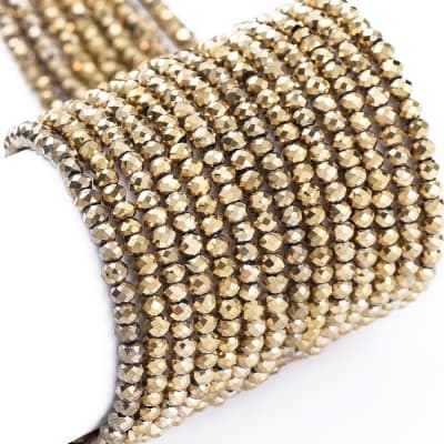 CRISTAL AUSTRIACO POR TIRA 2X1.5MM ELECTROPLATE ORO LUZ