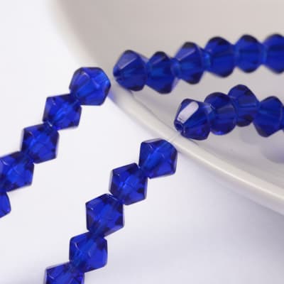 CRISTAL AUSTRIACO POR TIRA 4MM BICONO AZUL OSCURO