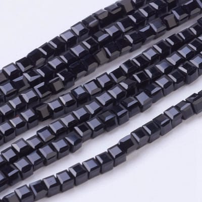 CRISTAL AUSTRIACO POR TIRA CUBO NEGRO 2X2MM1