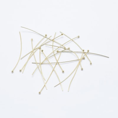 VASTAGO BAÑO DE ORO CON BALIN CHAMPAGNE 20MM