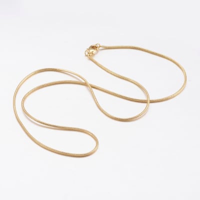 CADENA LISTA B/ORO SERPIENTE REDONDA 45CM1
