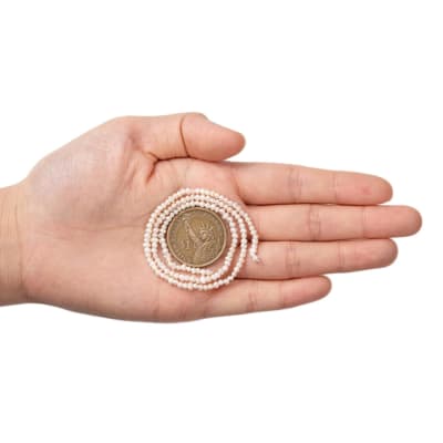 PERLAS POR TIRA DE RIO 2-3MM1