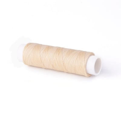 HILO POLIESTER CREMA 0.35MM1