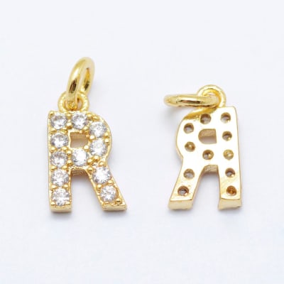COLGANTE B/ORO INICIAL CON ZIRCONES R 7X8MM1