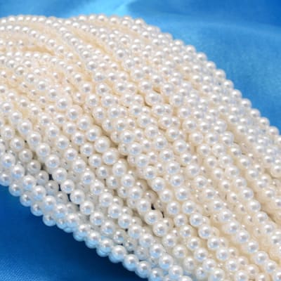 PERLAS DE NACAR REDONDA POR TIRA 2.5MM1