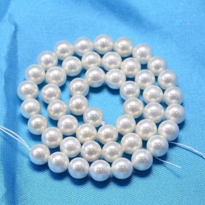 PERLAS DE NACAR REDONDA LISA POR TIRA 6MM1