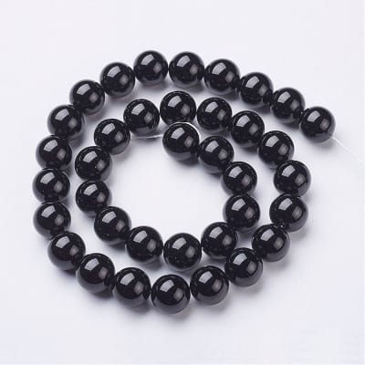 ONIX NEGRO NATURAL TEÑIDO LISO 10MM, AGUJERO:1MM , APROX. 37~39PCS