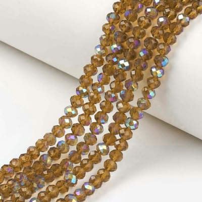 CRISTAL AUSTRIACO POR TIRA 4X3MM ELECTROPLATE VARA DE ORO OSCURO