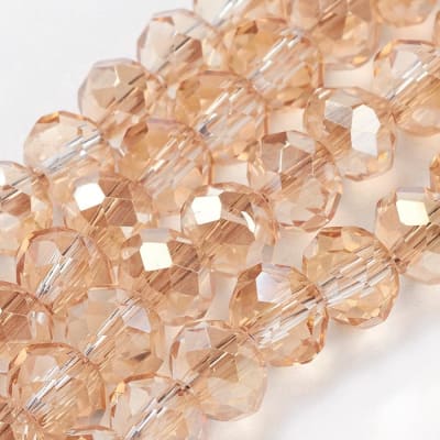CRISTAL AUSTRIACO 6X4MM POR TIRA VARA DE ORO PALIDO