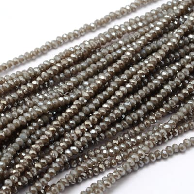 CRISTAL AUSTRIACO POR TIRA 2MM ELECT. CAQUI OSCURO