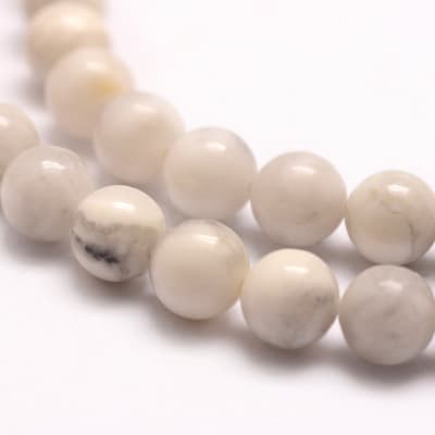 HOWLITA NATURAL REDONDAS  LISAS 8MM AGUJERO 1MM1