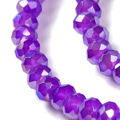 CRISTAL AUSTRIACO ELECTROPLATE POR TIRA MORADO AB 3X2MM APROX. 135-140PCS1