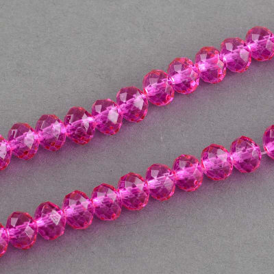 CRISTAL AUSTRIACO POR TIRA ROSA OSCURO 8X6MM  APROX. 62PCS.1
