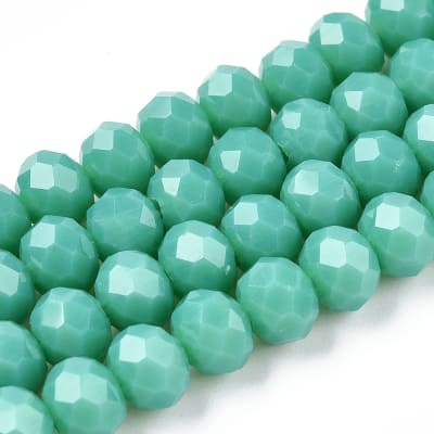 CRISTAL AUSTRIACO POR TIRA 2.3~2.7x1.5MM VERDEMAR CLARO APROX. 140PCS.