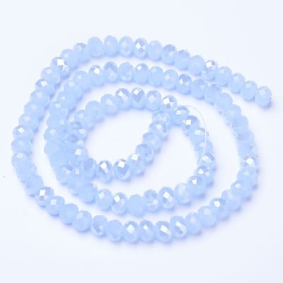 CRISTAL AUSTRIACO POR TIRA AZULCIELO 2.3~2.7x1.5MM APROX. 140PCS.1