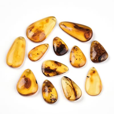 PIEDRA NATURAL ÁMBAR GOTA 19.5~33x12~20.5x2.5~6.5MM IRREGULAR1