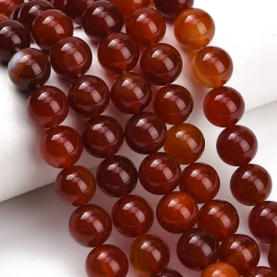 CORNALINA NATURAL REDONDO LISO GRADO B 12MM APROX. 33PCS.1