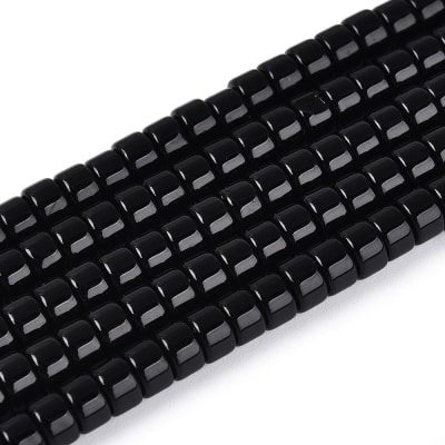 CRISTAL AUSTRIACO POR TIRA PLANO REDONDO NEGRO 4~4.5x3MM APROX. 129PCS.
