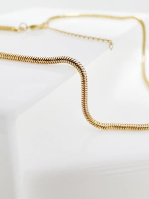 CADENA LISTA B/ORO SERPIENTE REDONDA GRUESA 39CM1