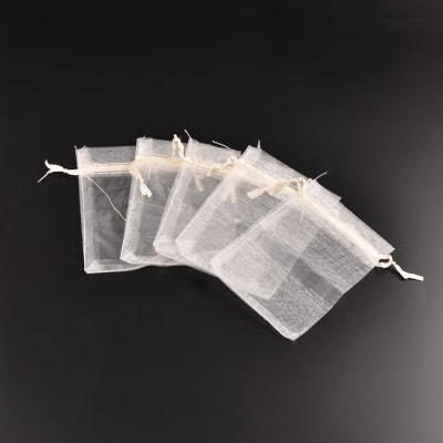 BOLSAS DE ORGANZA CREMA 9X7CM 100UND1