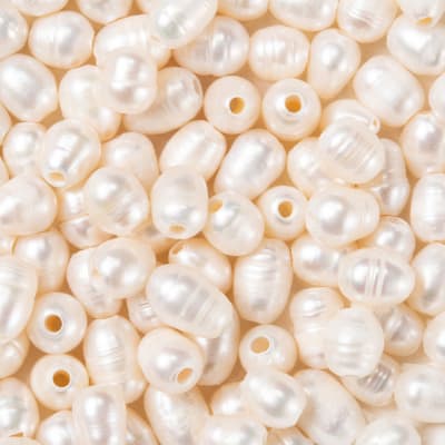 PERLA IND. DE RIO IRREGULAR 7-10MM PERF:1.8MM