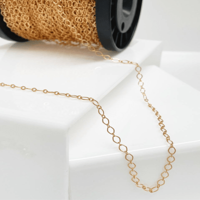 CADENA POR METRO B/O ESLABON Y ARGOLLAS CHAMPAGNE 5X3MM