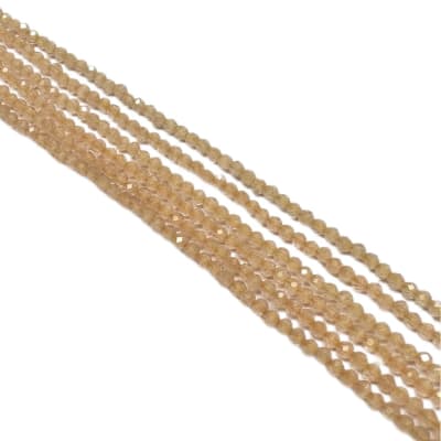 CRISTAL AUSTRIACO POR TIRA 2MM SALMON CLARO 2