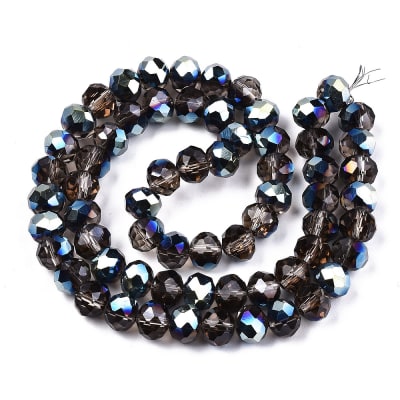 CRISTAL AUSTRIACO POR TIRA 8x6MM TORNASOL OSCURO