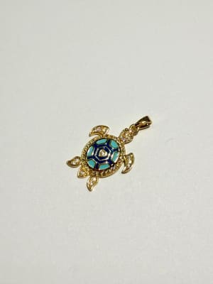 COLGANTE B/ORO TORTUGA CELESTE Y AZUL MARINO CON CIRCONES Y VALIER 18.7X26.1MM1