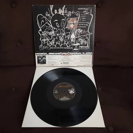 TIRO DE GRACIA MELAZA VINILO2