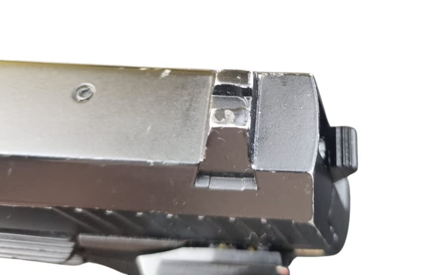 Pistola cal. 4.5 mm mod HK45 Co2 - Producto con detalle estético y embalaje6