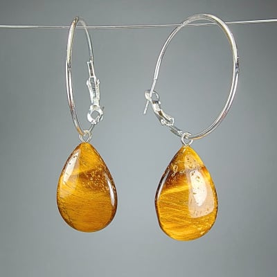 Argollas Con Dijes De Ojo De Tigre Y Fantasía Plateada en Gotas Planas de 23 mm1