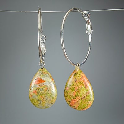 Argollas Con Dijes De Unakita Y Fantasía Plateada en Gotas Planas de 23 mm1