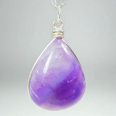 Colgante De Cuarzo Amatista en Cabuchón Gota de 25 mm1