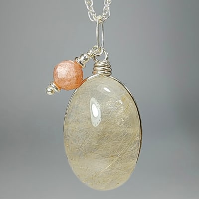 Colgante De Cuarzo Rutilo, Cuarzo Ahumado Y Piedra Sol en Cabuchón Oval de 24 mm1