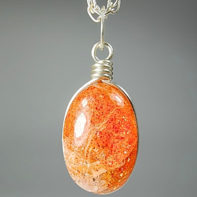 Colgante De Piedra Sol en Cabuchón Oval de 15 mm1