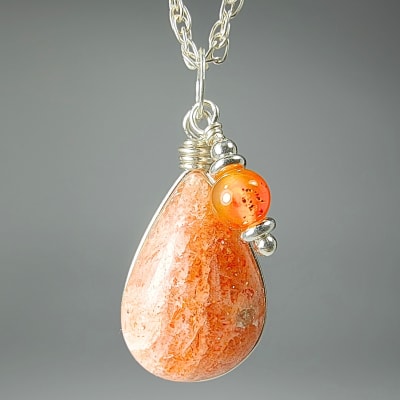 Colgante De Piedra Sol Y Ágata Cornalina en Cabuchón Gota de 18 mm1