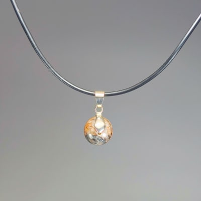 Colgante Perla De Rodonita Negra Y Fantasía Plateada de 12 mm1