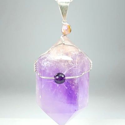 Colgante Rejilla De Cuarzo Amatista Y Turmalina Rosa en Biterminado desde 60 mm
