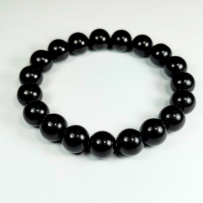 Pulsera De Ónix Negro en Perlas de 10 mm1