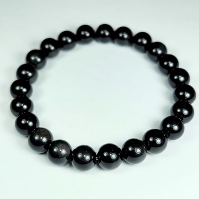 Pulsera De Obsidiana Con Destellos Plateados en Perlas de 8 mm1