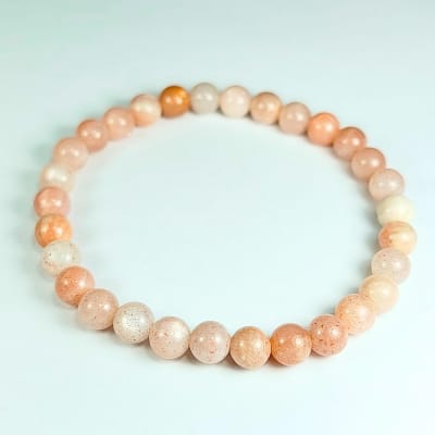 Pulsera De Piedra Luna De Seda Rosa en Perlas de 6 mm